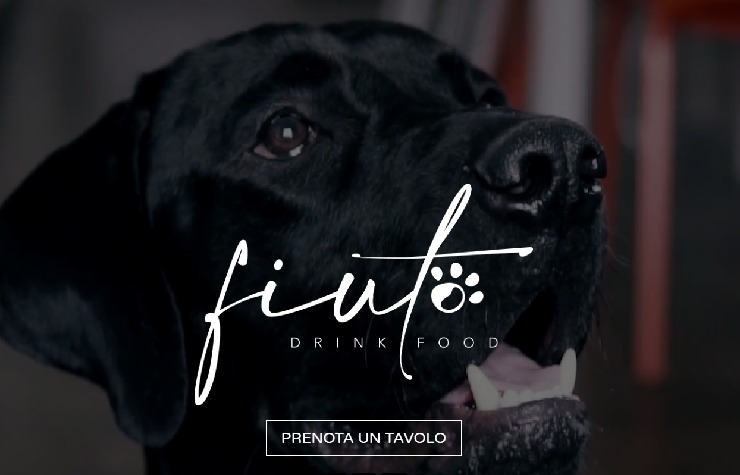 Homepage Fiuto con un cane nero